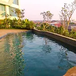 Minimalist And Homey 1Br Grand Kamala Lagoon Apartment By Travelio