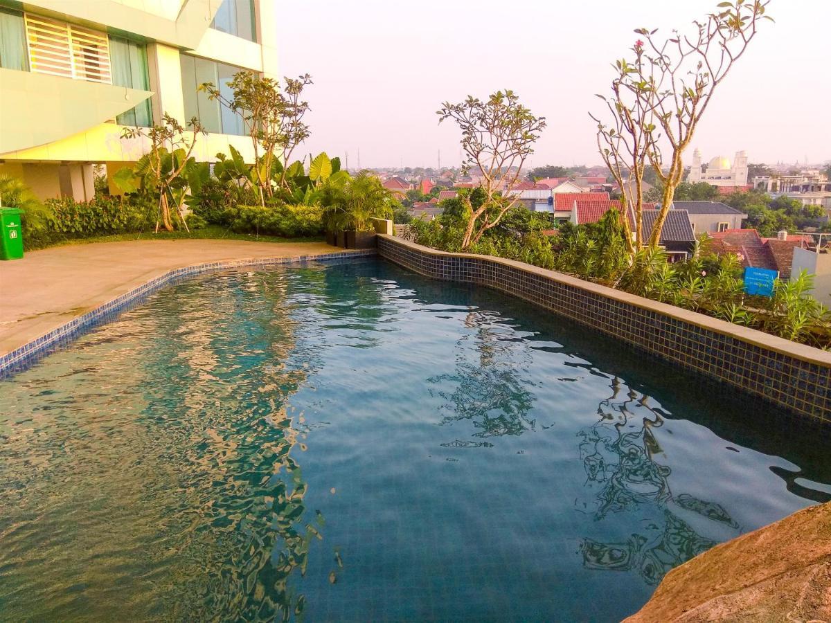 Minimalist And Homey 1br Grand Kamala Lagoon By Travelio Apartemen *